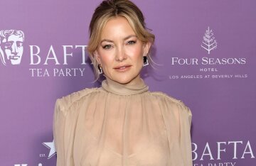 Gwyneth Paltrow, Kate Hudson (in a sheer blouse), Kristen Stewart, and Ethan Hawke at the BAFTA Tea Party