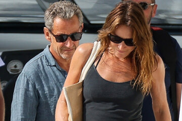 Off-duty: Carla Bruni and Nicolas Sarkozy relax on a yacht in Spain