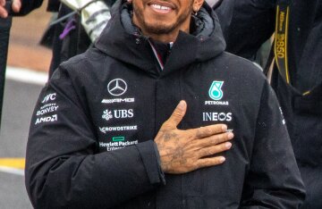 Lewis Hamilton in racing suit and cap at the 2022 British Grand Prix