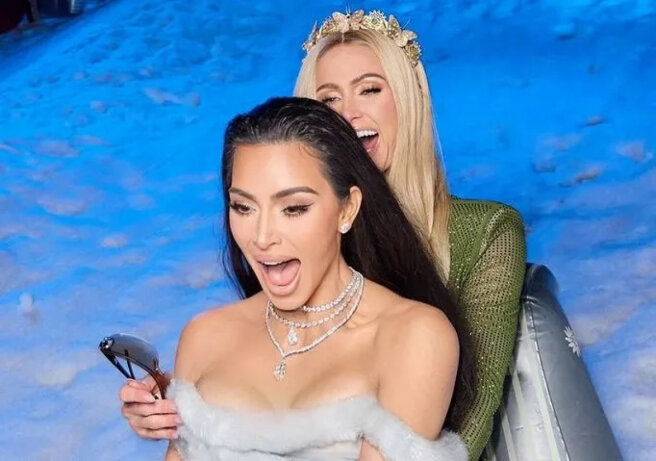 Kim Kardashian and Paris Hilton shared new photos from their Christmas party