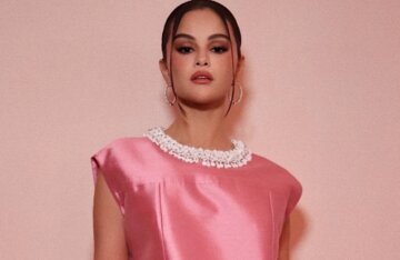 Selena Gomez attended her cosmetics brand's party in a pink minidress.