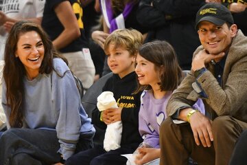 Rare appearance: Mila Kunis and Ashton Kutcher appeared in public with grown-up children