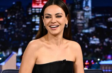 Mila Kunis appeared in public in a dominatrix-style dress.