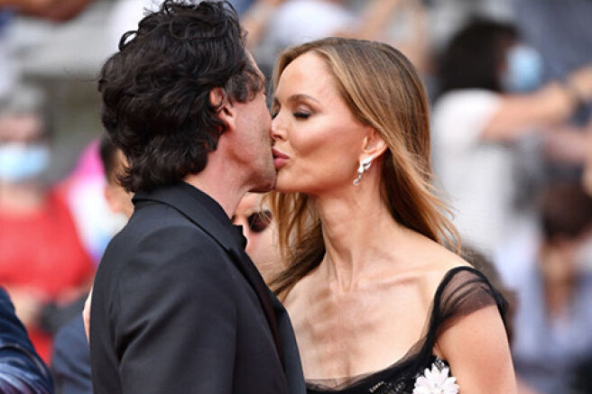 Cannes kiss: Adrian Brody and his beloved Georgina Chapman at the premiere of " The French Messenger"