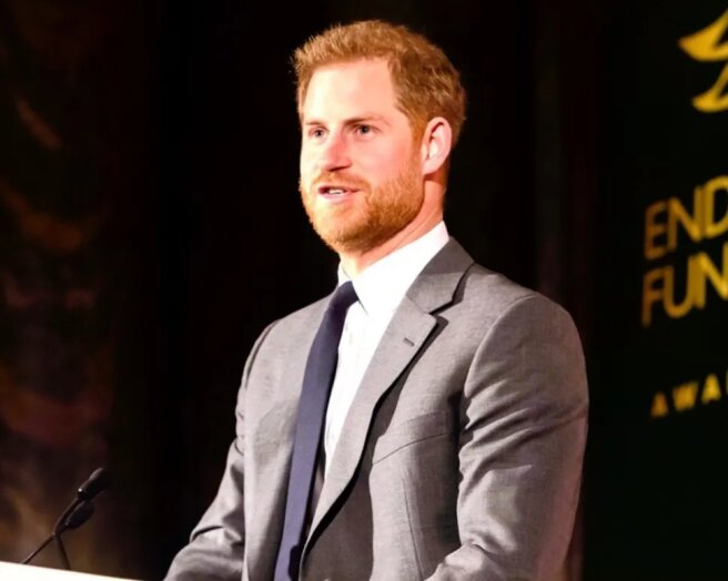 Prince Harry gave a speech at the NFL awards ceremony, but did not mention his father with cancer
