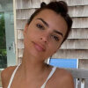 Transparent suit and sandals in winter: pregnant Emily Ratajkowski poses on the street