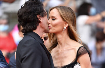 Cannes kiss: Adrian Brody and his beloved Georgina Chapman at the premiere of " The French Messenger"