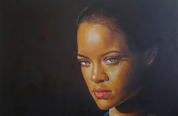 Rihanna posing on a red carpet in 2019