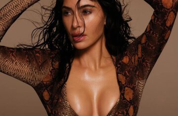 Kim Kardashian starred in a “snake” swimsuit in an advertising campaign for a new swimwear collection
