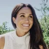 The organizer of paid retreats featuring Meghan Markle called her "divine"