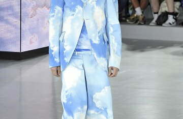 Model on the runway at a John Galliano menswear show in Paris