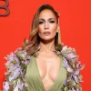 Cape with flowers and deep neckline: Jennifer Lopez attended the Elie Saab show in Paris