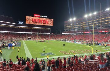 Fans and players at a San Francisco 49ers home NFL game