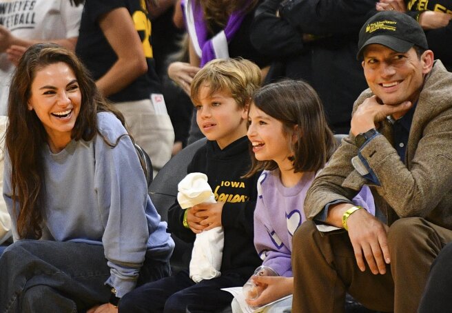Rare appearance: Mila Kunis and Ashton Kutcher appeared in public with grown-up children
