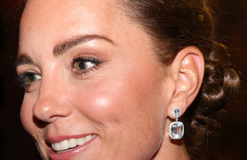 Catherine, Princess of Wales, smiling in a portrait