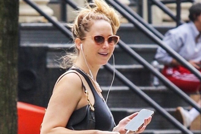 In a great mood: pregnant Jennifer Lawrence on a walk in New York