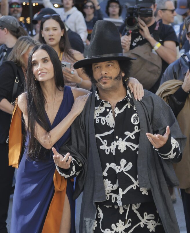 Деми Мур и Бутс Райли