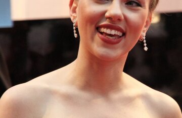 Scarlett Johansson posing at a press event