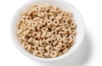 A bowl filled with Cheerios cereal
