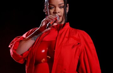 “My overalls didn’t fasten.” Rihanna says she didn't plan to announce her second pregnancy at the Super Bowl