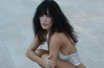 Bianca Censori attended husband Kanye West's concert in a skintight jumpsuit.