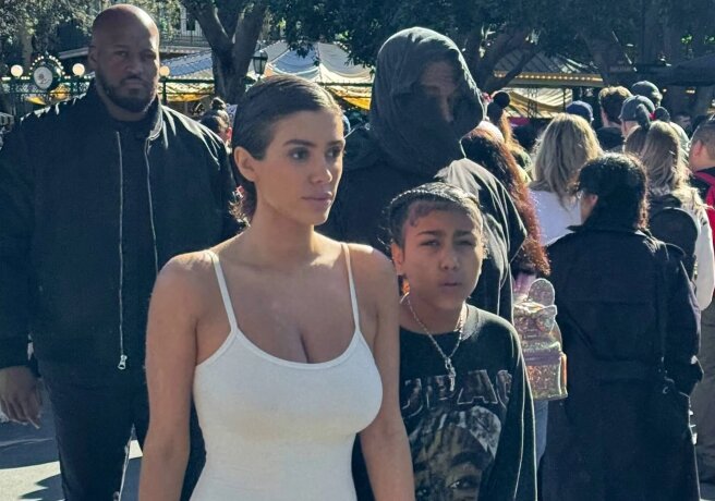 Kanye West with his wife Bianca Censori and daughter North at Disneyland