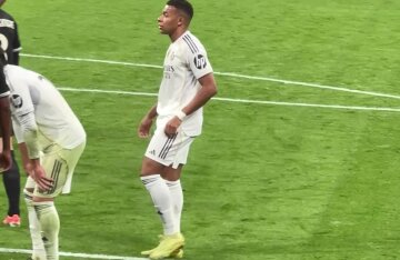 Kylian Mbappe in a Real Madrid kit during a Champions League match