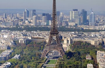 The Eiffel Tower seen from the Champ de Mars park in Paris