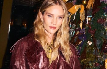Rosie Huntington-Whiteley attended a fashion party in London in a leather coat.