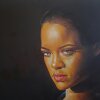 Rihanna hit Paris Fashion Week in a shimmering gold tinsel skirt suit