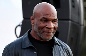 Mike Tyson beat up a man on board a plane