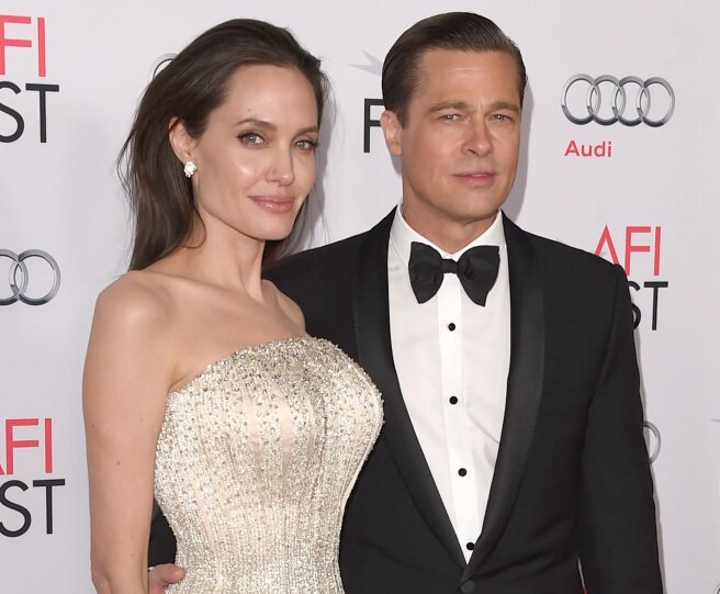 "He was embarrassed." Brad Pitt ran into Angelina Jolie's father and brother at the opening of an exhibition, where he came with his girlfriend