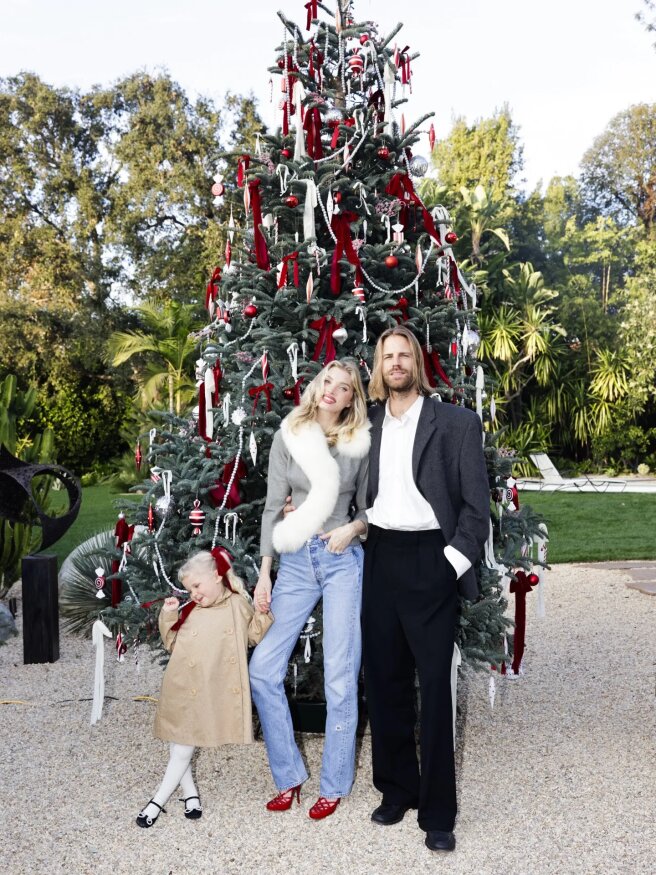 Эльза Хоск и Том Дейли с дочерью