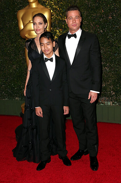 Angelina Jolie and Brad Pitt with their son Maddox