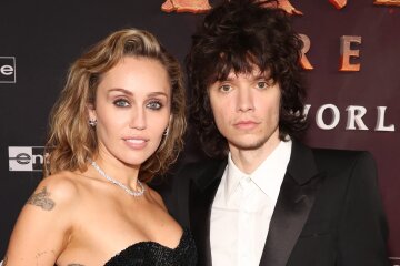 Miley Cyrus hinted at an engagement to boyfriend Max Morando.