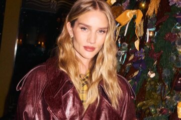 Rosie Huntington-Whiteley attended a fashion party in London in a leather coat.