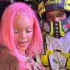 Rihanna in a black dress and pink hair supported A$AP Rocky at the opening of the new Puma F1 store