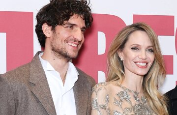 Angelina Jolie (in a nude dress) and Louis Garrel stepped out together amid romance rumors