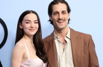 Måneskin frontman Damiano David and his girlfriend (in a "bride dress") stepped out after their engagement.