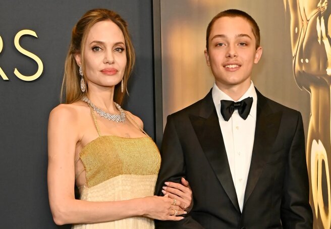 "He only sees kids on the red carpet." Angelina Jolie went out with her youngest son Knox "to spite" Brad Pitt