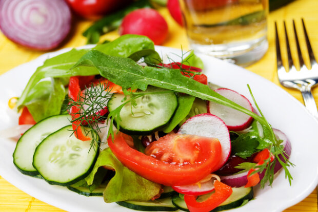 Radish, avocado, tomato and cucumber salad