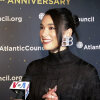 Dua Lipa’s Literature Festival style: Chanel red knit by day, Prada by night
