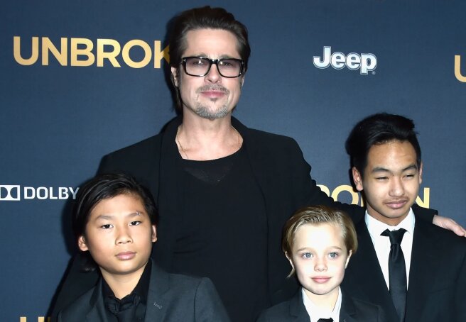 'He's changed and he wants Angelina and Pax to see it' Brad Pitt wants to make peace with son who called him a 'world-class asshole'