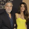 George and Amal Clooney at the film premiere in Los Angeles