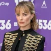 Margot Robbie, Lindsay Lohan, Gillian Anderson, and Emma Corrin hit the red carpet.