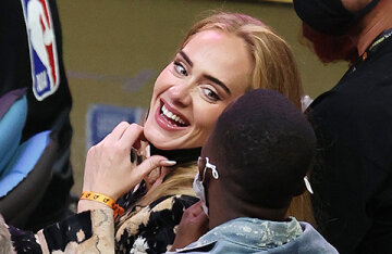 Rare exit: Adele attended the NBA semifinal match