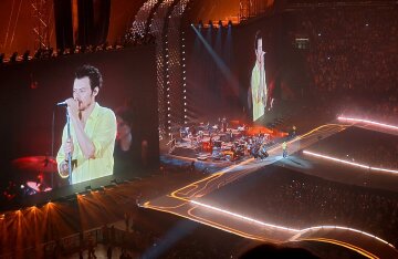 Harry Styles performing live on stage during his Together, Together tour