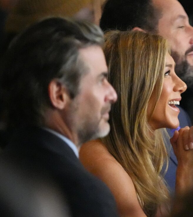 Джим Кёртис и Дженнифер Энистон