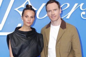 Rare appearance: Alicia Vikander and Michael Fassbender at the Louis Vuitton show in Paris