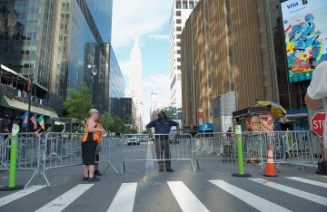 Taylor Swift and Travis Kelce holding hands outside Madison Square Garden in New York